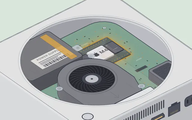 Una Mac mini abierta por abajo: la fuente de poder, el ventilador y el chip M4 sobre la tarjeta.